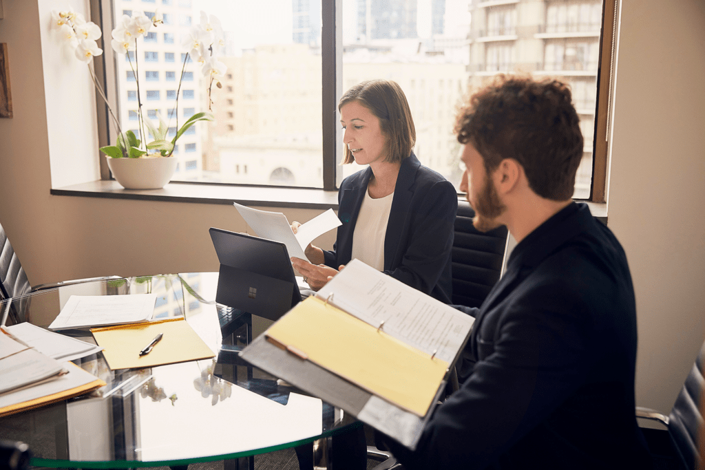 Lawyer and client going over workers comp questions